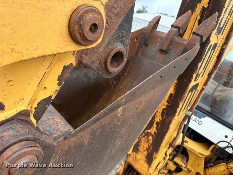 image for item OI9138 1996 New Holland 555E backhoe