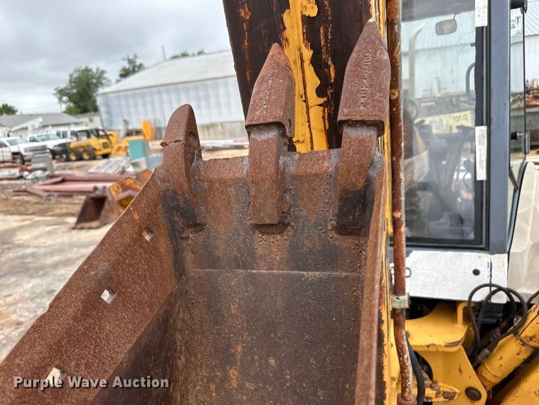 image for item OI9138 1996 New Holland 555E backhoe