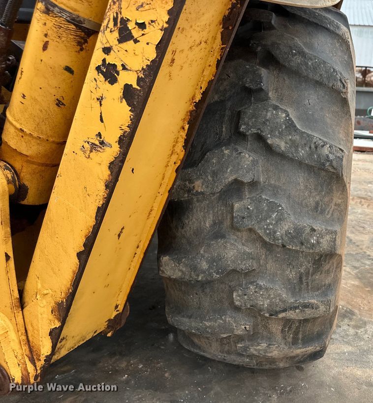 image for item OI9138 1996 New Holland 555E backhoe