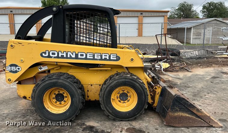 image for item OI9144 1999 John Deere 250 skid steer loader
