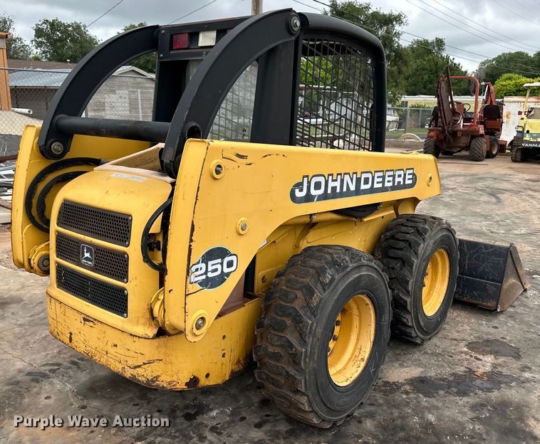 image for item OI9144 1999 John Deere 250 skid steer loader
