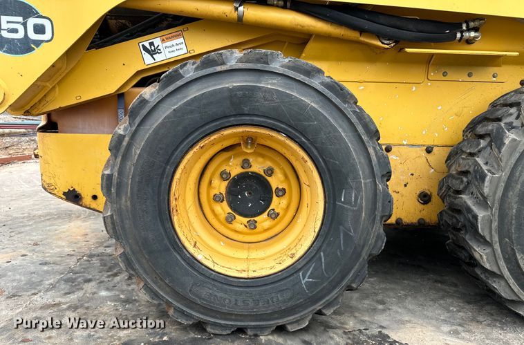 image for item OI9144 1999 John Deere 250 skid steer loader