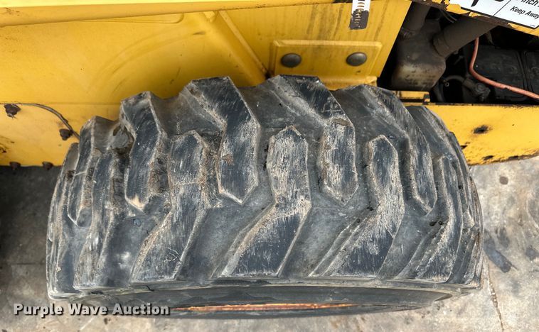 image for item OI9144 1999 John Deere 250 skid steer loader