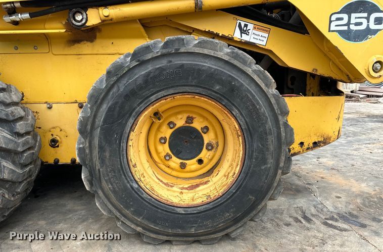 image for item OI9144 1999 John Deere 250 skid steer loader