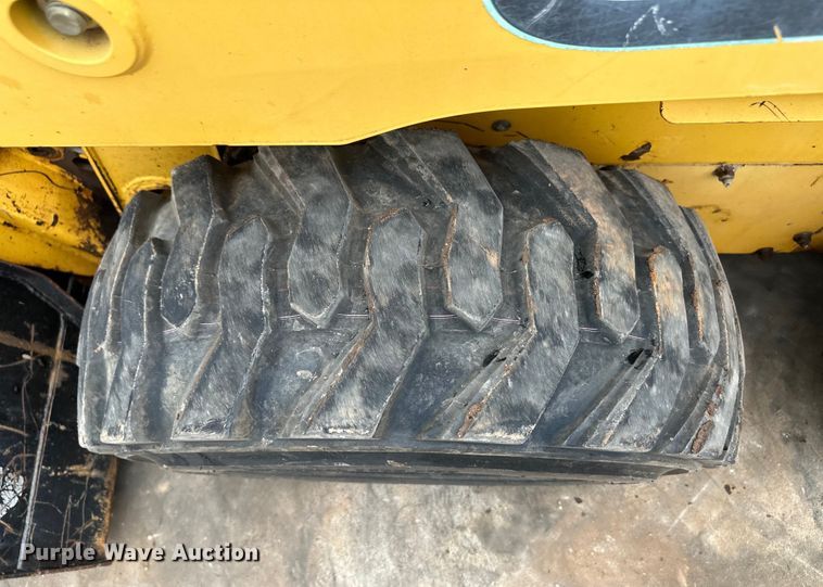 image for item OI9144 1999 John Deere 250 skid steer loader