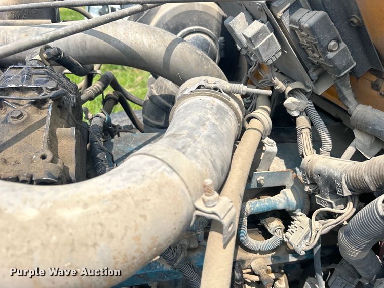 image for item NB9401 1998 International  4700 pothole patcher truck