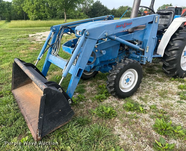 image for item NT9320 1996 Ford  1715 MFWD tractor