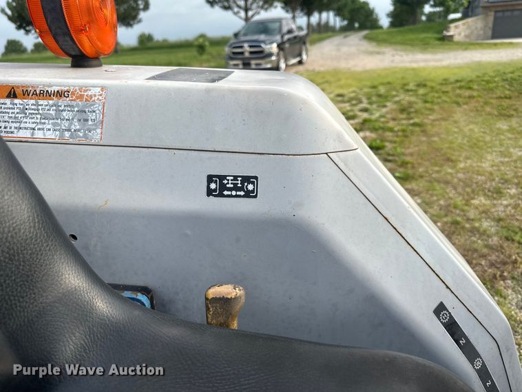 image for item NT9320 1996 Ford  1715 MFWD tractor