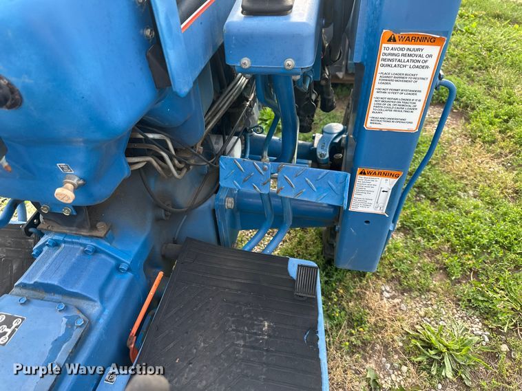 image for item NT9320 1996 Ford  1715 MFWD tractor