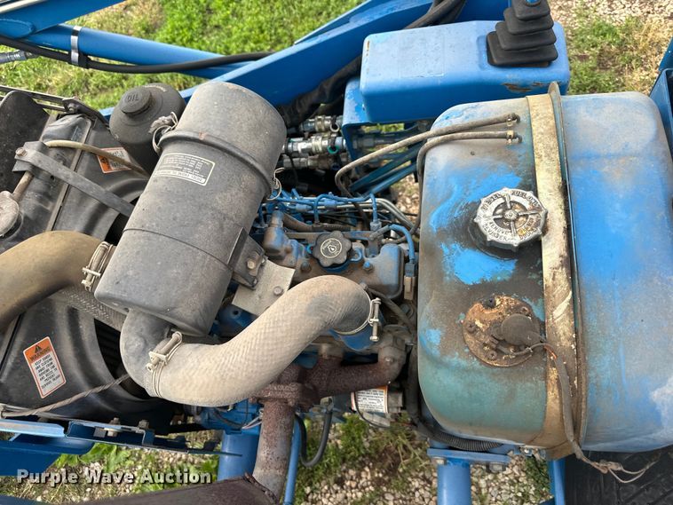 image for item NT9320 1996 Ford  1715 MFWD tractor