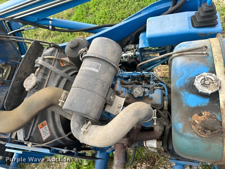 image for item NT9320 1996 Ford  1715 MFWD tractor