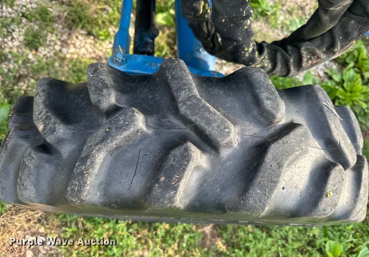 image for item NT9320 1996 Ford  1715 MFWD tractor