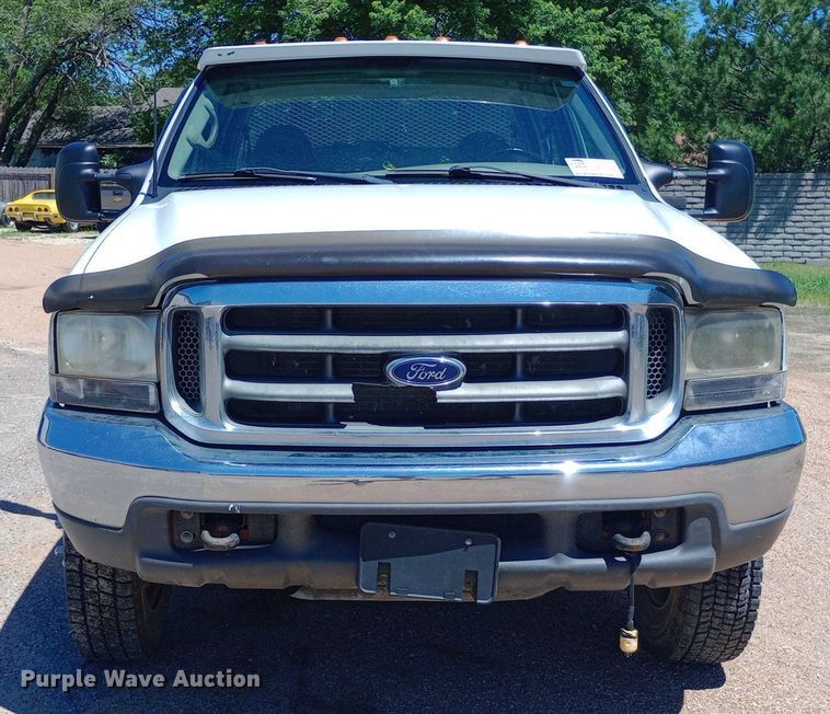 image for item DQ7135 2000 Ford F450 Super Duty Crew Cab flatbed truck