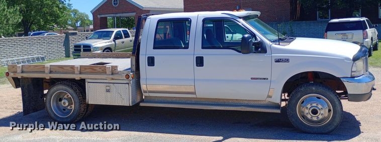 image for item DQ7135 2000 Ford F450 Super Duty Crew Cab flatbed truck