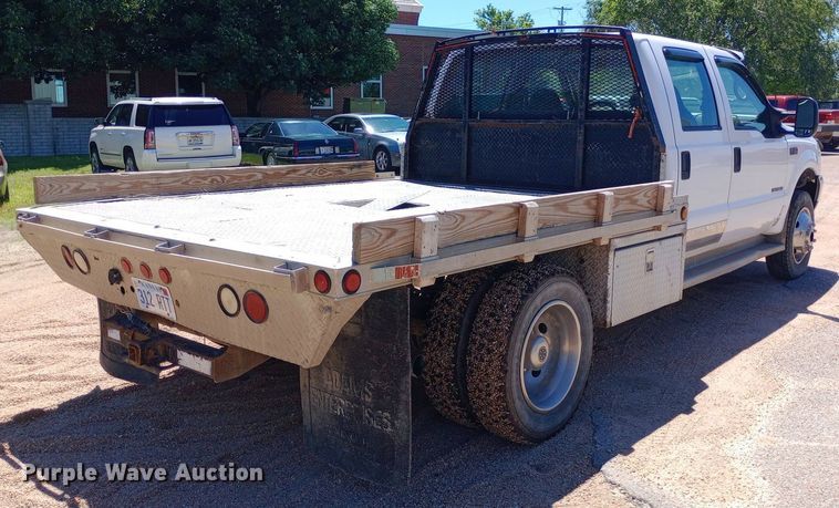 image for item DQ7135 2000 Ford F450 Super Duty Crew Cab flatbed truck