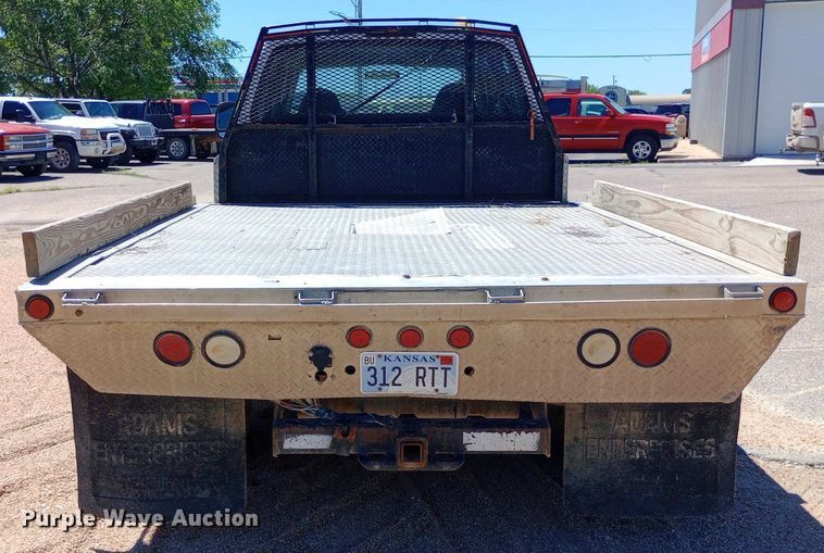 image for item DQ7135 2000 Ford F450 Super Duty Crew Cab flatbed truck