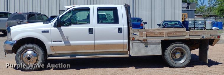 image for item DQ7135 2000 Ford F450 Super Duty Crew Cab flatbed truck