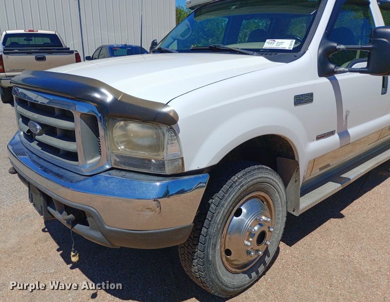 image for item DQ7135 2000 Ford F450 Super Duty Crew Cab flatbed truck