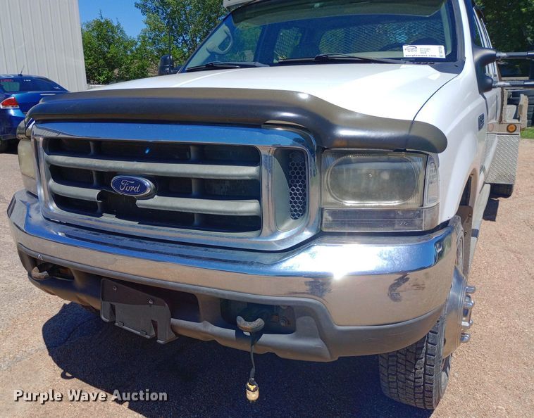 image for item DQ7135 2000 Ford F450 Super Duty Crew Cab flatbed truck