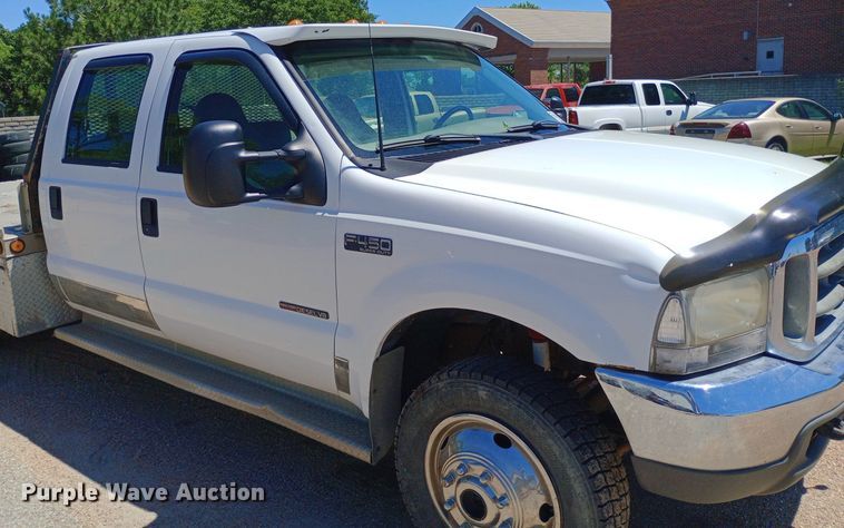 image for item DQ7135 2000 Ford F450 Super Duty Crew Cab flatbed truck