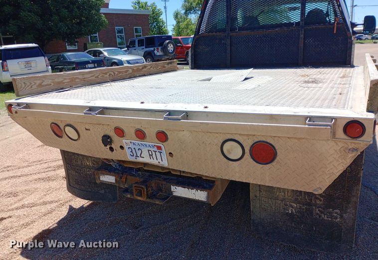 image for item DQ7135 2000 Ford F450 Super Duty Crew Cab flatbed truck