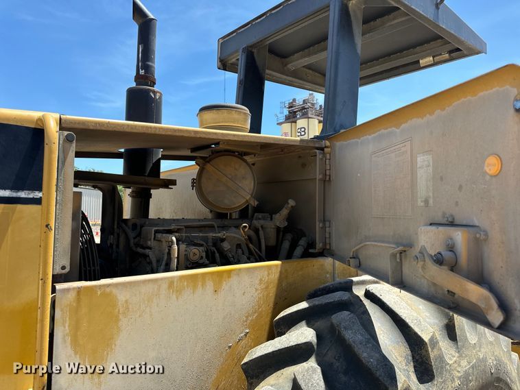 image for item DL4455 2000 Caterpillar CP-563C single drum vibratory roller