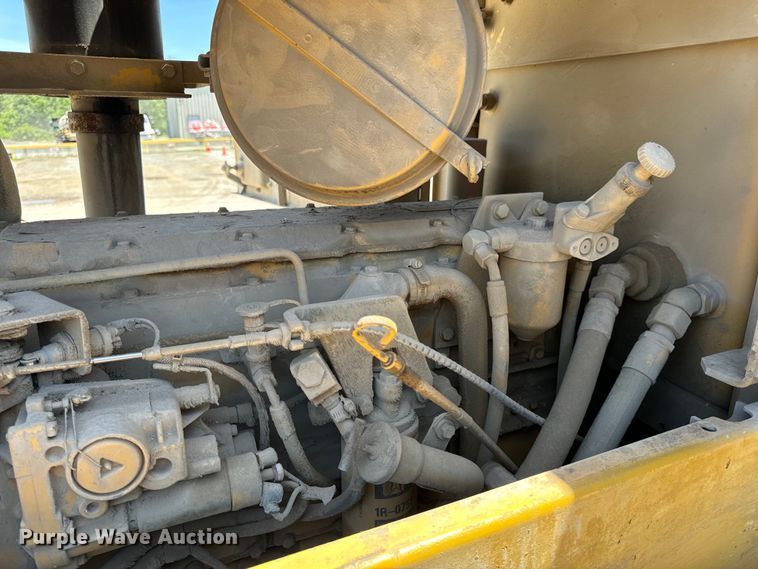 image for item DL4455 2000 Caterpillar CP-563C single drum vibratory roller