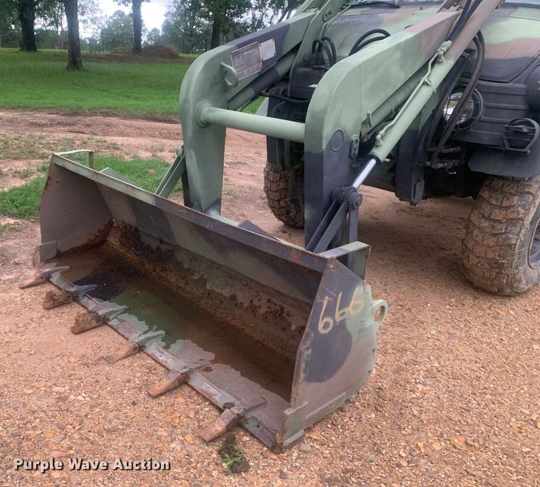 image for item DM7877 1989 Freightliner Unimog FLU419 emplacement excavator