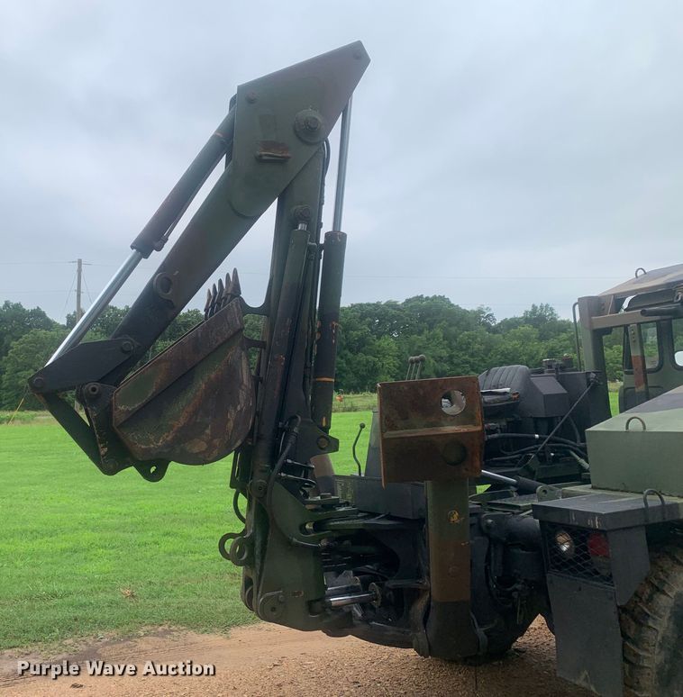 image for item DM7877 1989 Freightliner Unimog FLU419 emplacement excavator