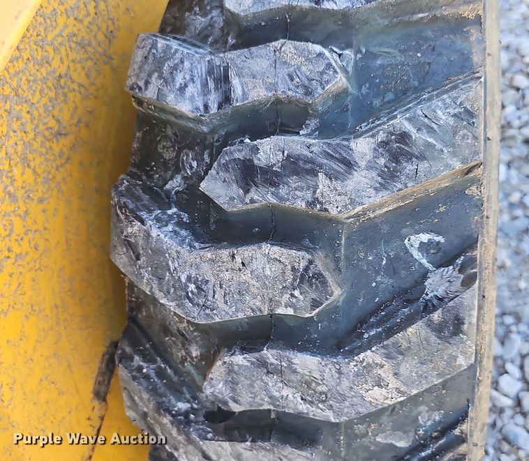 image for item DP6468 1995 John Deere 7775 skid steer loader