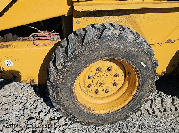 image for item DP6468 1995 John Deere 7775 skid steer loader