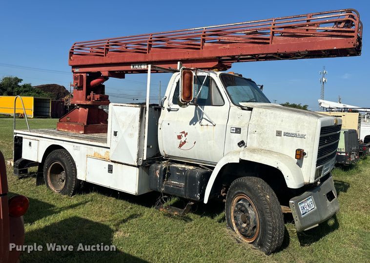 image for item DS2496 1981 Chevrolet C70 flatbed truck with boom ladder