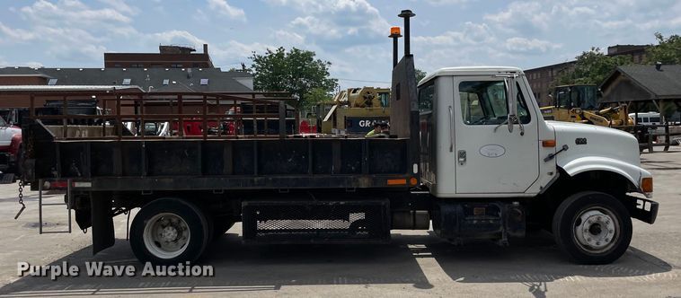 image for item DS5519 1998 International  4700 dump flatbed truck