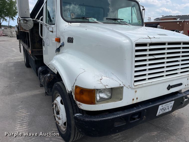 image for item DS5519 1998 International  4700 dump flatbed truck
