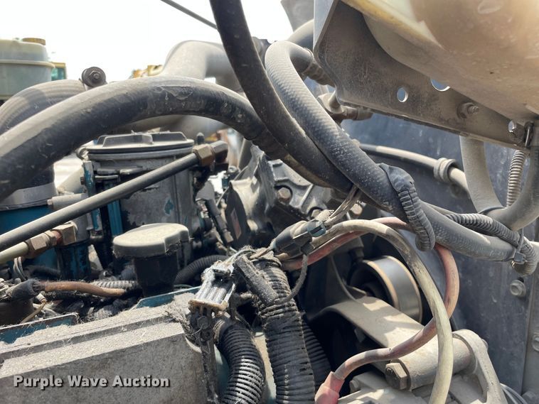 image for item DS5519 1998 International  4700 dump flatbed truck