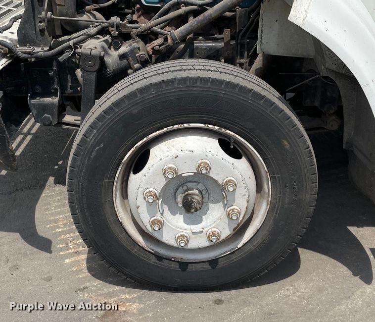 image for item DS5519 1998 International  4700 dump flatbed truck