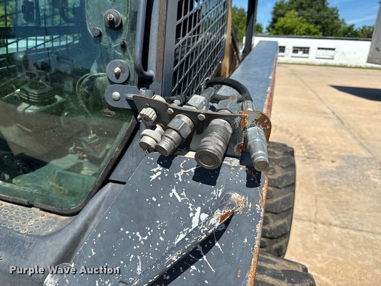 image for item DX0737 2010 John Deere 328D skid steer loader