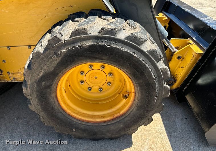 image for item DX0737 2010 John Deere 328D skid steer loader