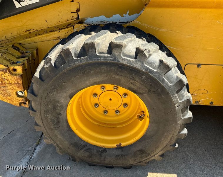 image for item DX0737 2010 John Deere 328D skid steer loader