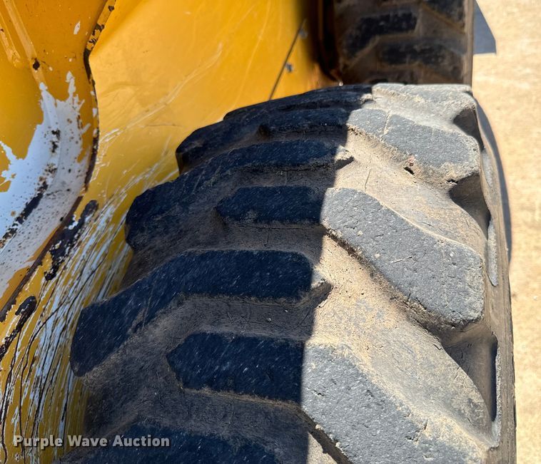 image for item DX0737 2010 John Deere 328D skid steer loader