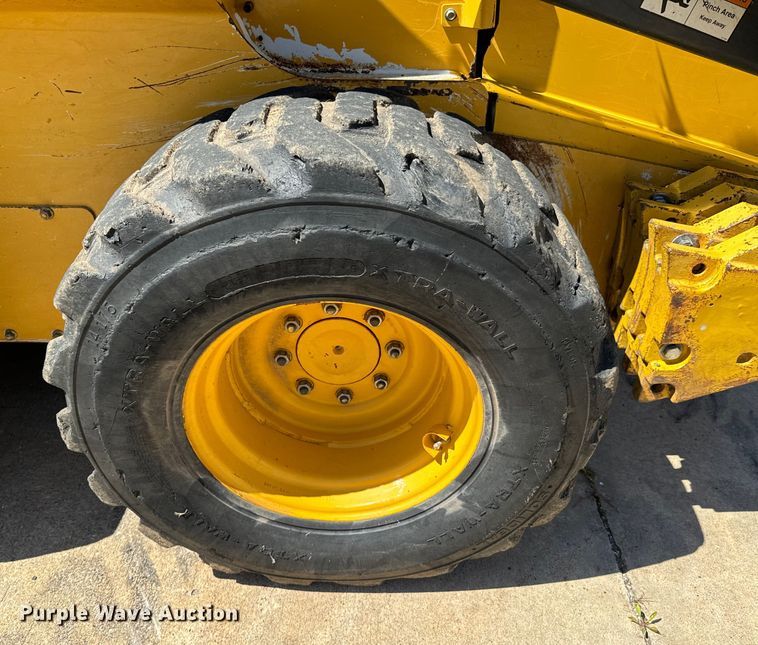 image for item DX0737 2010 John Deere 328D skid steer loader