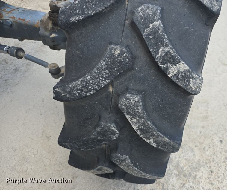 image for item DM1737 Kubota M125X MFWD tractor