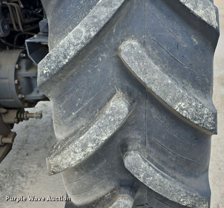 image for item DM1737 Kubota M125X MFWD tractor