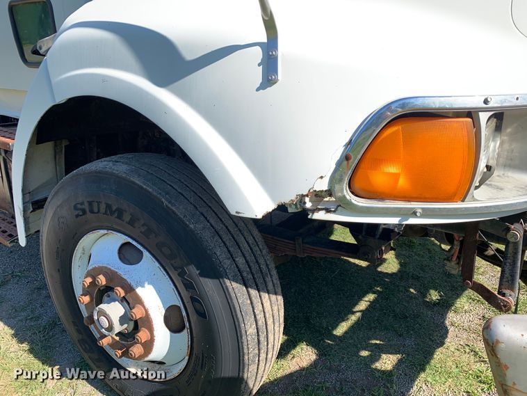 image for item DM7911 1999 Sterling L8513 refuse truck