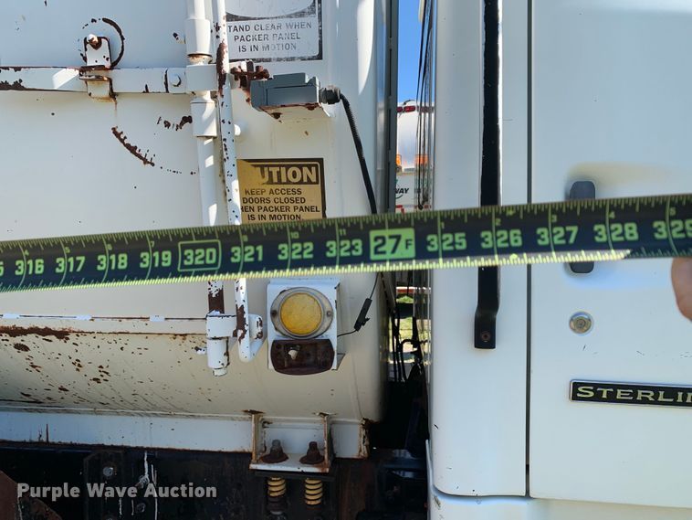 image for item DM7911 1999 Sterling L8513 refuse truck