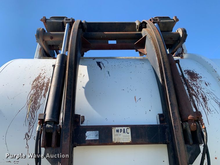 image for item DM7911 1999 Sterling L8513 refuse truck