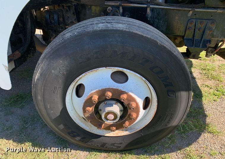 image for item DM7911 1999 Sterling L8513 refuse truck