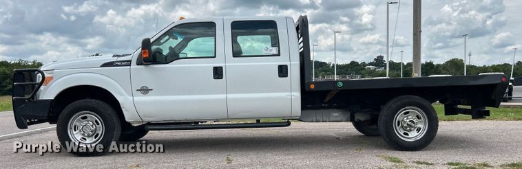 image for item DO6537 2014 Ford F350 Super Duty  Crew Cab flatbed pickup truck