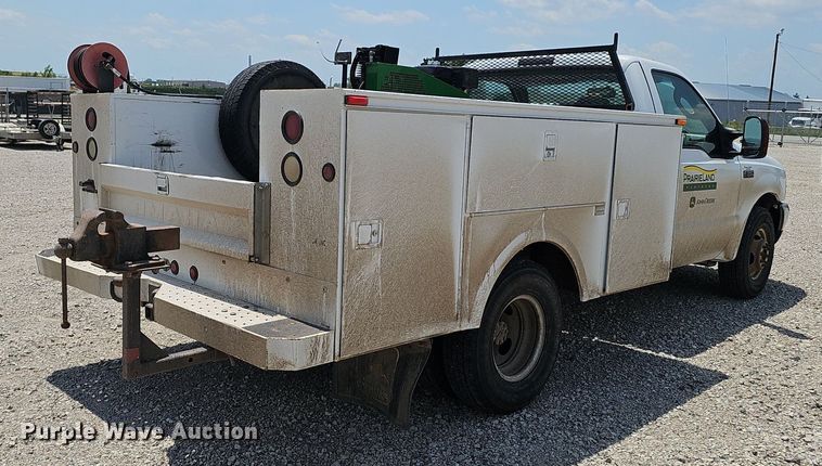 image for item DP0975 2004 Ford F350 Super Duty XLT utility bed pickup truck