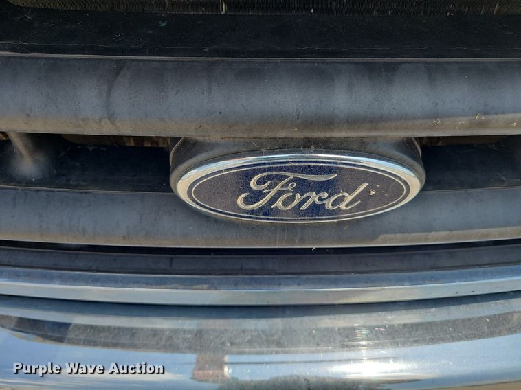 image for item DP0975 2004 Ford F350 Super Duty XLT utility bed pickup truck